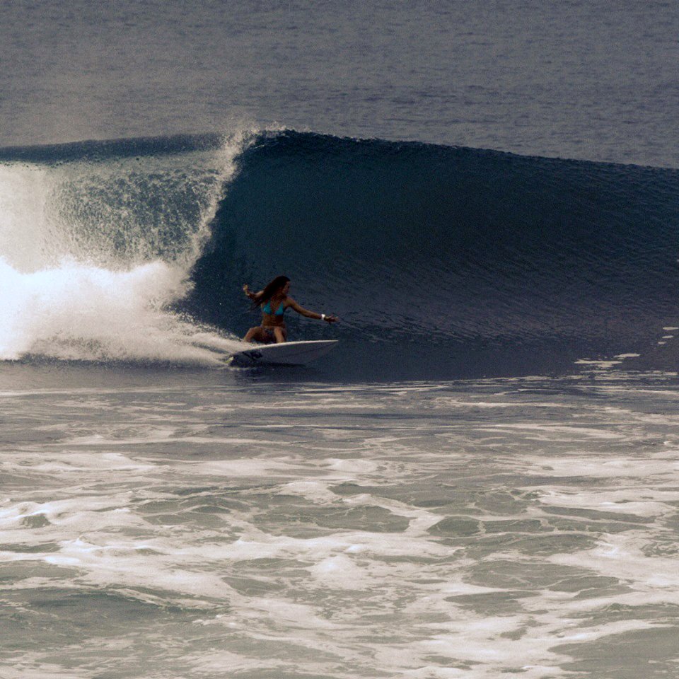Molli Miller Surfing